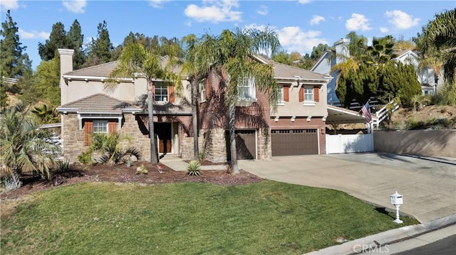 15355 Michael Crest Dr, Canyon Country, CA 91387 - view of front of house with driveway, a garage, a chimney, stone siding, and stucco siding