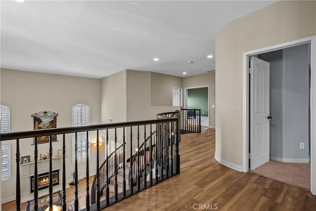 15355 Michael Crest Dr, Canyon Country, CA 91387 - corridor featuring an upstairs landing, wood finished floors, and recessed lighting