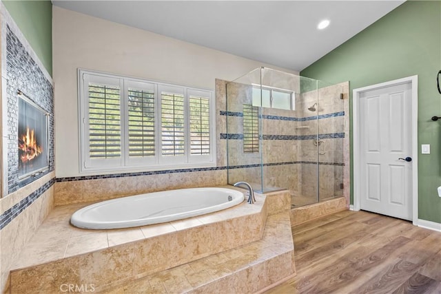 15355 Michael Crest Dr, Canyon Country, CA 91387 - bathroom with a bath, lofted ceiling, a stall shower, and wood finished floors