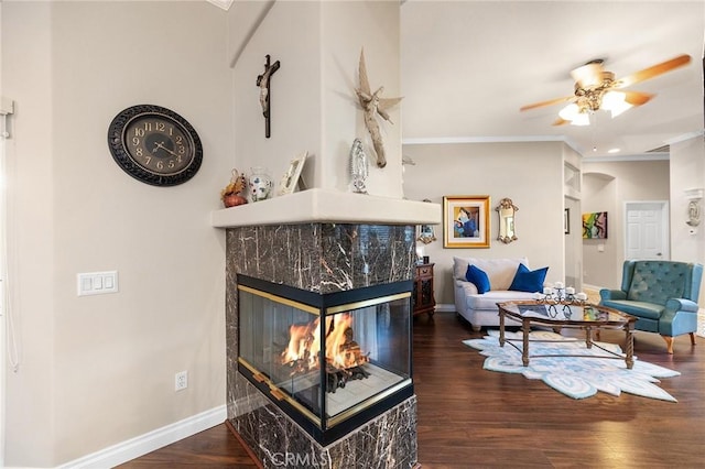 2157 Pecan Tree St, Hemet, CA 92545 - living area with ornamental molding, wood finished floors, ceiling fan, and a fireplace