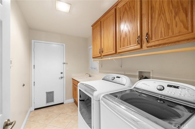 2157 Pecan Tree St, Hemet, CA 92545 - laundry room with cabinet space, separate washer and dryer, and light tile patterned floors