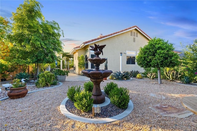 2157 Pecan Tree St, Hemet, CA 92545 - back of house with stucco siding and a tile roof