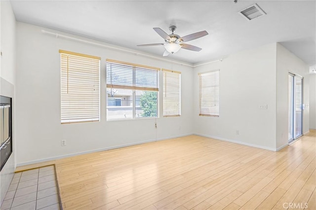 39635 Columbia Union Dr Unit C, Murrieta, CA 92563 - unfurnished living room with ceiling fan and light wood finished floors