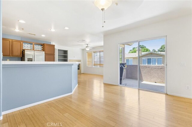 39635 Columbia Union Dr Unit C, Murrieta, CA 92563 - unfurnished living room featuring ceiling fan, recessed lighting, and light wood-style flooring