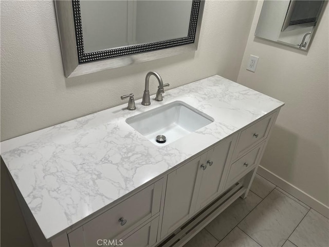 552 Canyon Dr Unit 38, Oceanside, CA 92054 - bathroom featuring vanity and marble finish flooring