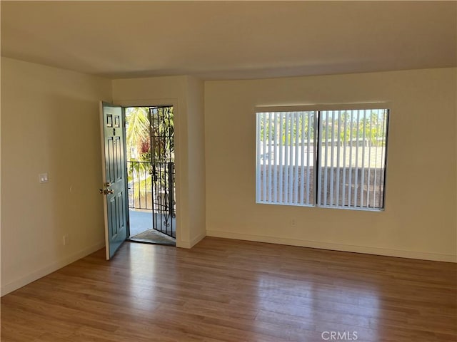 552 Canyon Dr Unit 38, Oceanside, CA 92054 - empty room with wood finished floors