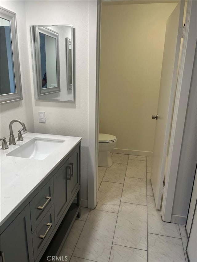 552 Canyon Dr Unit 38, Oceanside, CA 92054 - bathroom with marble look tile flooring and vanity