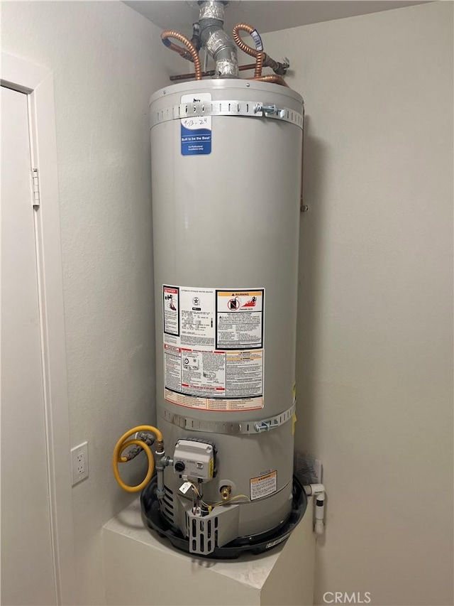 552 Canyon Dr Unit 38, Oceanside, CA 92054 - utility room with strapped water heater