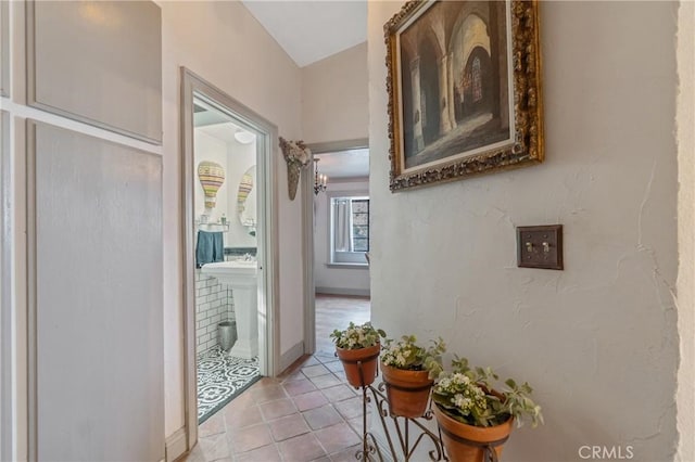 24042 Ingomar St, West Hills, CA 91304 - hall featuring light tile patterned floors