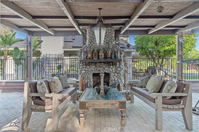 24042 Ingomar St, West Hills, CA 91304 - view of patio with an outdoor living space with a fireplace