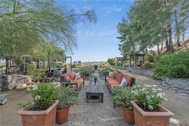 24042 Ingomar St, West Hills, CA 91304 - view of patio with an outdoor living space and a pergola