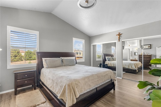 37152 57th St E, Palmdale, CA 93552 - bedroom featuring lofted ceiling and wood finished floors