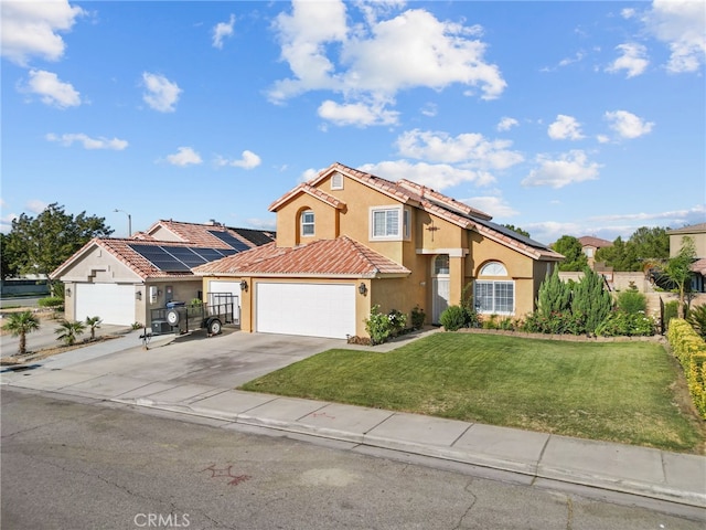 37152 57th St E, Palmdale, CA 93552 - traditional home featuring stucco siding, concrete driveway, a tile roof, roof mounted solar panels, and a garage