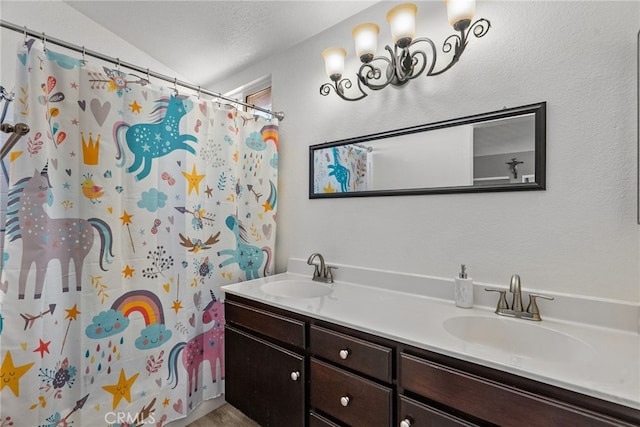 37152 57th St E, Palmdale, CA 93552 - bathroom with double vanity, a shower with shower curtain, and vaulted ceiling