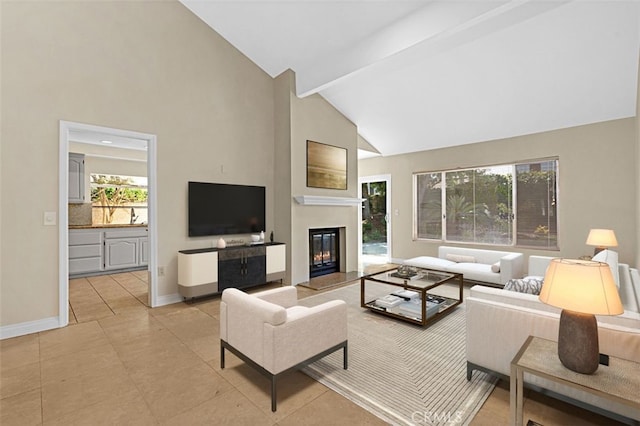 3386 Montagne Way, Thousand Oaks, CA 91362 - living area with high vaulted ceiling, a glass covered fireplace, and light tile patterned floors