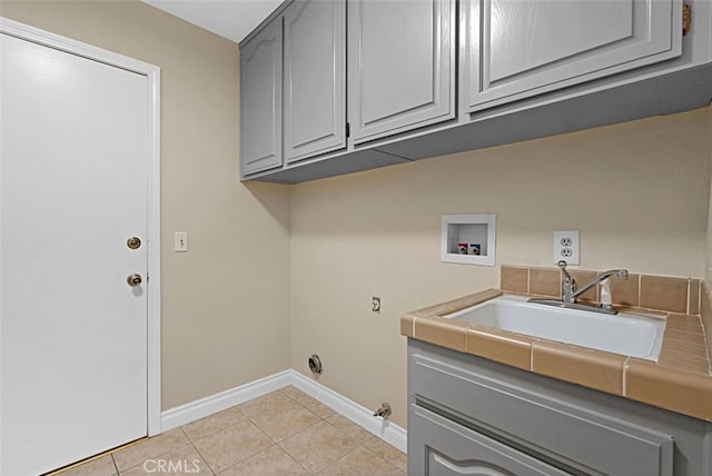 3386 Montagne Way, Thousand Oaks, CA 91362 - laundry room featuring washer hookup, cabinet space, and light tile patterned floors
