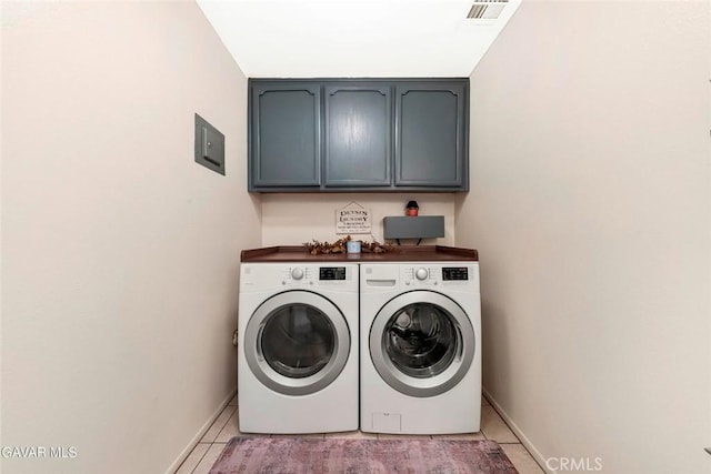 425 W W Ave J5, Unit 36, Lancaster, CA 93534 - laundry area featuring washer and clothes dryer, cabinet space, and light tile patterned flooring