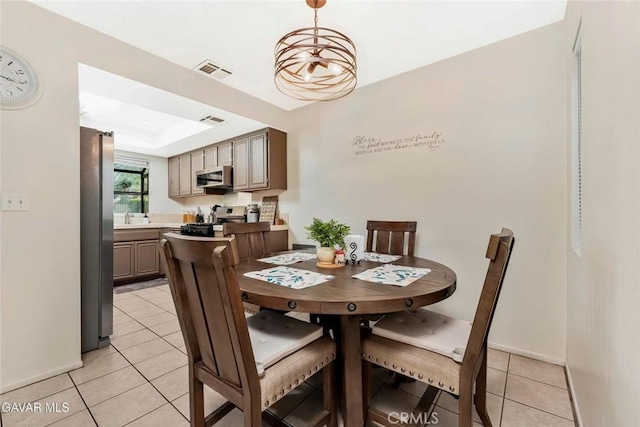 425 W W Ave J5, Unit 36, Lancaster, CA 93534 - dining room with light tile patterned floors and a raised ceiling