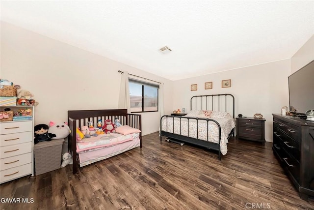425 W W Ave J5, Unit 36, Lancaster, CA 93534 - bedroom featuring dark wood-style floors