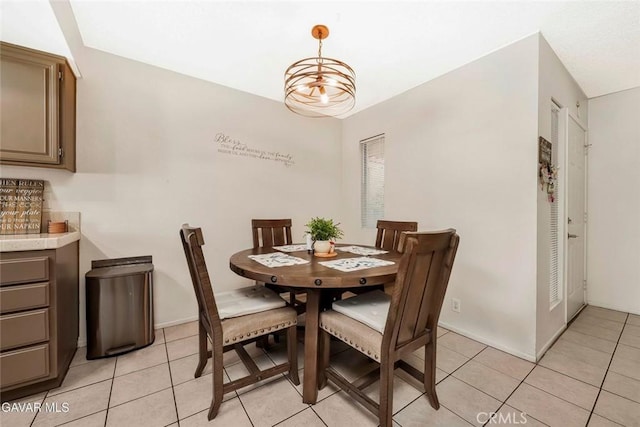 425 W W Ave J5, Unit 36, Lancaster, CA 93534 - dining space featuring light tile patterned flooring and a chandelier