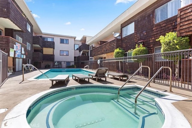 5403 Newcastle Ave Unit 19, Encino, CA 91316 - community pool with a patio and a hot tub