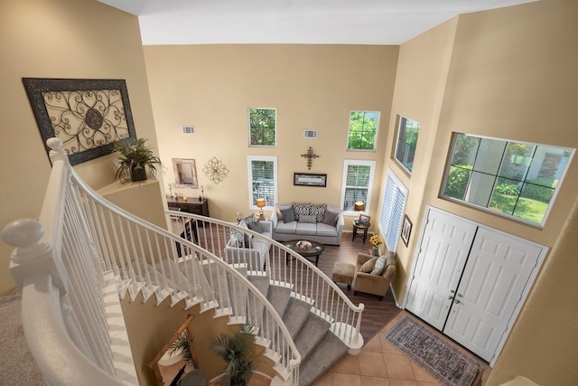 42207 Kimberly Way, Murrieta, CA 92562 - living room featuring a towering ceiling and tile patterned flooring