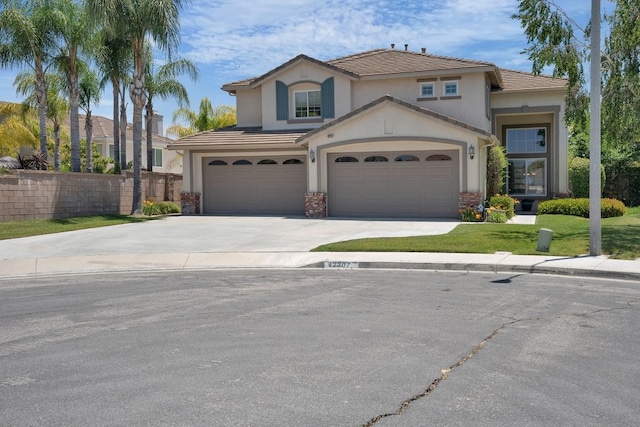 42207 Kimberly Way, Murrieta, CA 92562 - view of front of property featuring concrete driveway, stucco siding, a tiled roof, and a garage