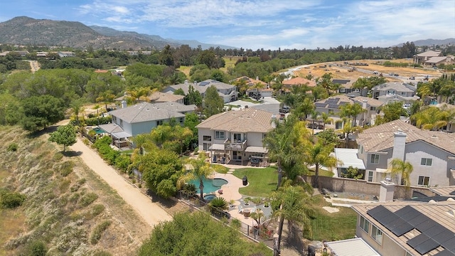 42207 Kimberly Way, Murrieta, CA 92562 - aerial perspective of suburban area with a pool and a mountainous background