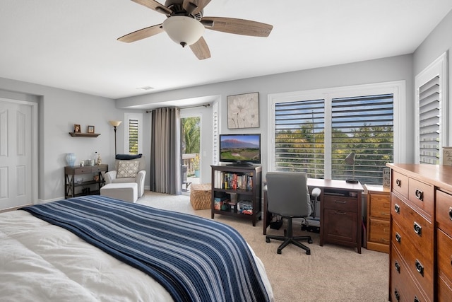 42207 Kimberly Way, Murrieta, CA 92562 - bedroom featuring access to outside, light colored carpet, an office area, and a ceiling fan