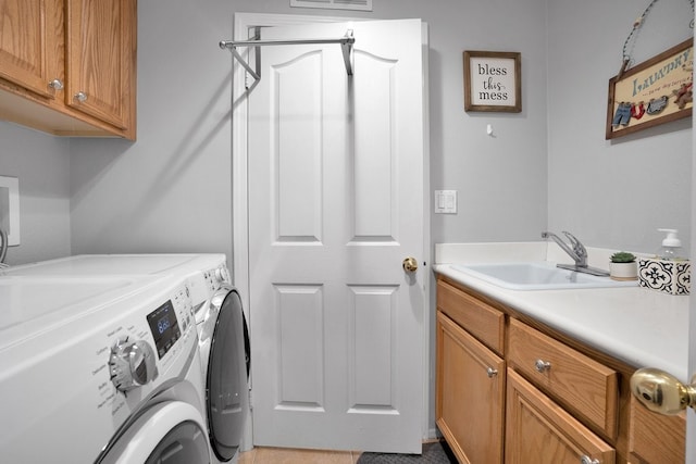 42207 Kimberly Way, Murrieta, CA 92562 - laundry room featuring cabinet space and washer and clothes dryer
