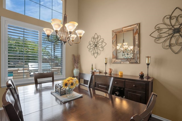 42207 Kimberly Way, Murrieta, CA 92562 - dining room with a chandelier and a high ceiling