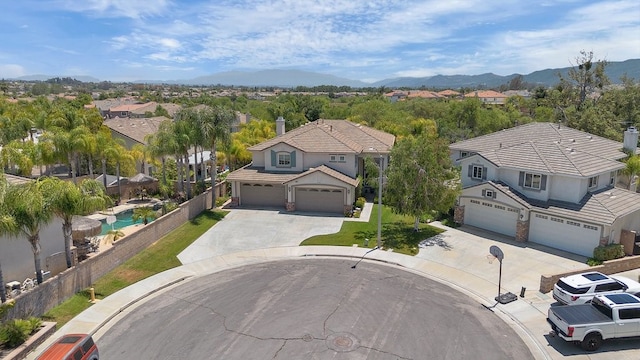 42207 Kimberly Way, Murrieta, CA 92562 - aerial view of residential area with a mountainous background and a pool area