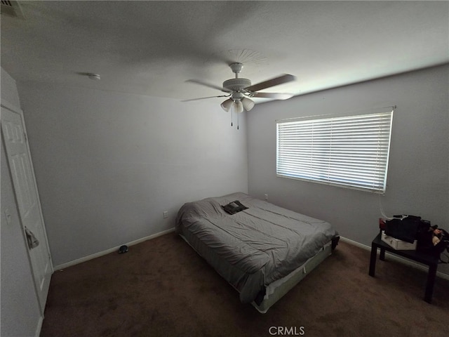 9294 Manteca Ave, Hesperia, CA 92345 - carpeted bedroom featuring a ceiling fan and baseboards