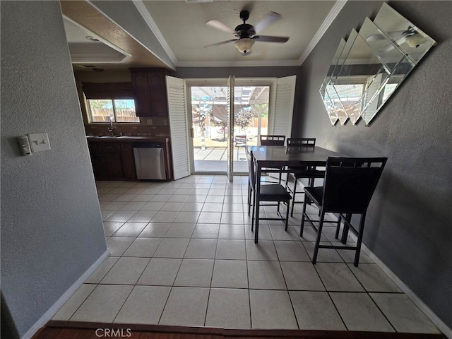 9294 Manteca Ave, Hesperia, CA 92345 - dining room featuring a textured wall, healthy amount of natural light, crown molding, a ceiling fan, and light tile patterned floors