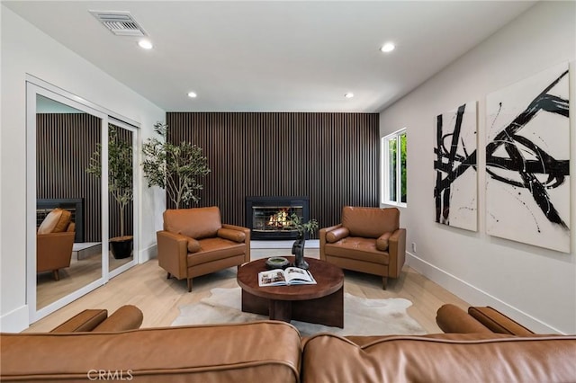 439 S Lamer St, Burbank, CA 91506 - living area with a glass covered fireplace, light wood-style flooring, and recessed lighting