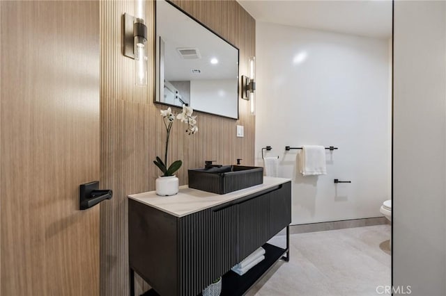 439 S Lamer St, Burbank, CA 91506 - bathroom featuring vanity and wood walls