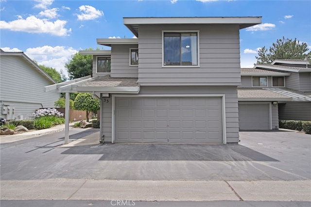 3350 M St Unit 33, Merced, CA 95348 - view of front of house with a garage