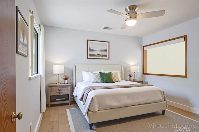 3350 M St Unit 33, Merced, CA 95348 - bedroom with light wood-type flooring and a ceiling fan