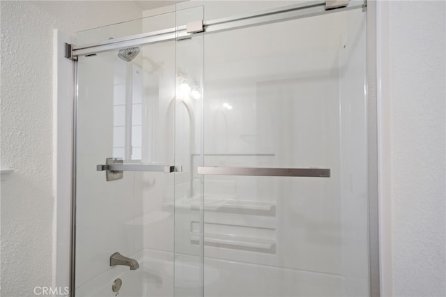 3350 M St Unit 33, Merced, CA 95348 - full bathroom with enclosed tub / shower combo and a textured wall