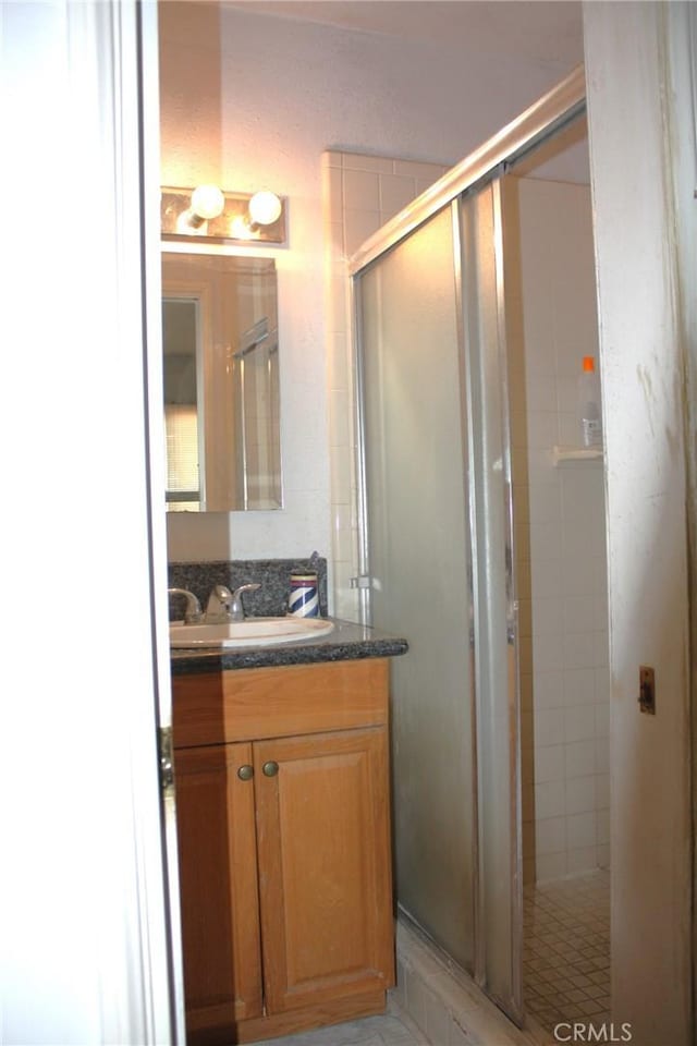 6400 Tournament Dr, Jurupa Valley, CA 92509 - full bath featuring vanity and a stall shower