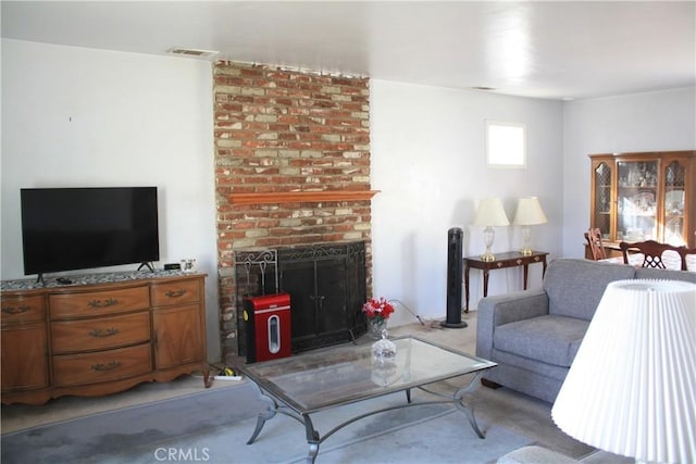 6400 Tournament Dr, Jurupa Valley, CA 92509 - living room with light colored carpet and a brick fireplace