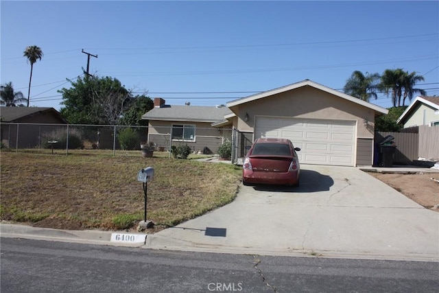 6400 Tournament Dr, Jurupa Valley, CA 92509 - ranch-style home with concrete driveway and a garage