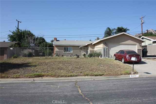 6400 Tournament Dr, Jurupa Valley, CA 92509 - ranch-style house featuring a garage and concrete driveway