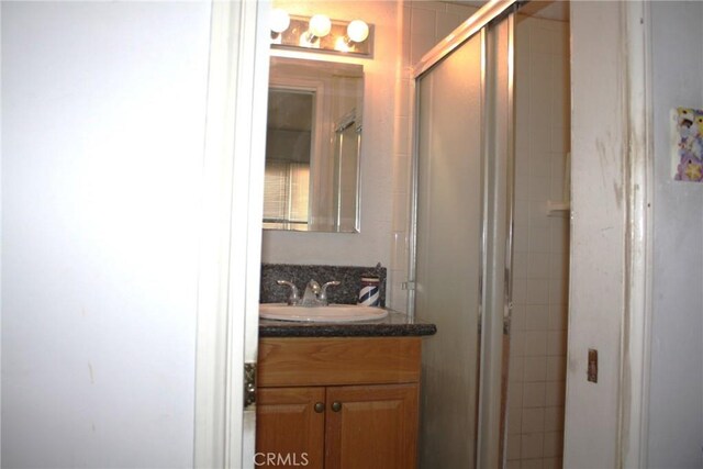 6400 Tournament Dr, Jurupa Valley, CA 92509 - bathroom featuring vanity and a shower stall