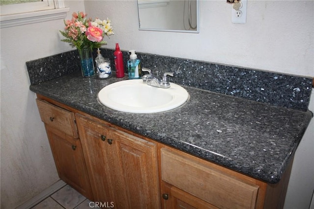 6400 Tournament Dr, Jurupa Valley, CA 92509 - bathroom with vanity and tile patterned flooring