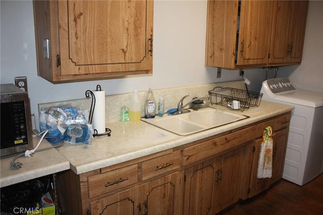 6400 Tournament Dr, Jurupa Valley, CA 92509 - laundry room with cabinet space, separate washer and dryer, and dark wood-type flooring