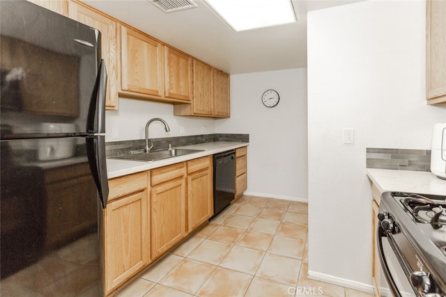 11124 Burbank Blvd Unit 101, North Hollywood, CA 91601 - kitchen featuring black appliances, light countertops, light brown cabinets, and light tile patterned flooring