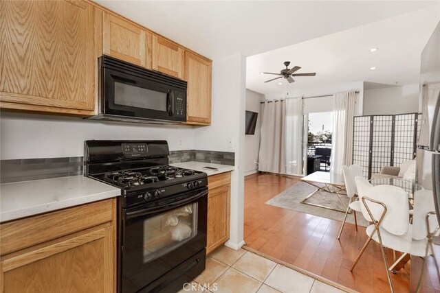 11124 Burbank Blvd Unit 101, North Hollywood, CA 91601 - kitchen featuring black appliances, ceiling fan, light countertops, light brown cabinetry, and recessed lighting