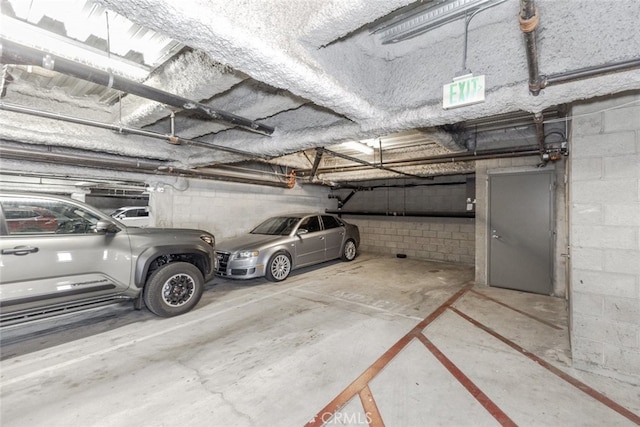 11124 Burbank Blvd Unit 101, North Hollywood, CA 91601 - parking deck featuring concrete block wall