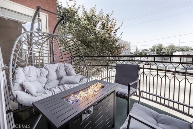 11124 Burbank Blvd Unit 101, North Hollywood, CA 91601 - balcony featuring an outdoor living space with a fire pit
